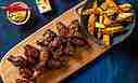 Chicken Wings mit Kartoffelspalten